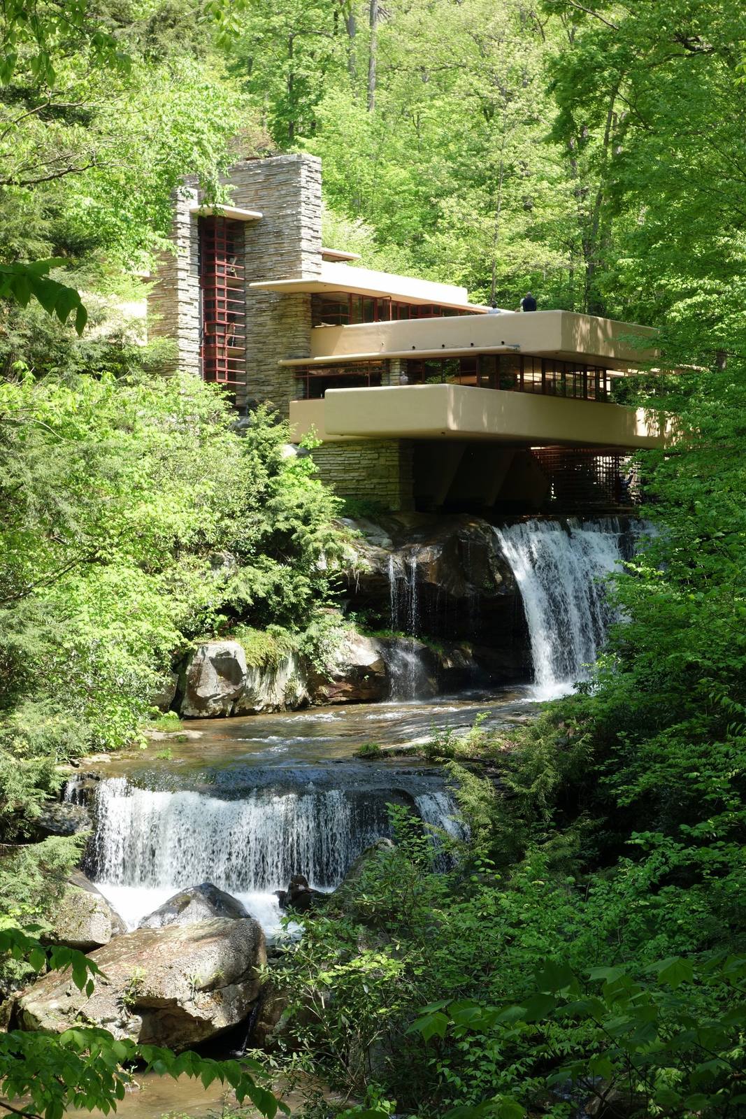 A terrace at Fallingwater, with the concrete planes and stone walls