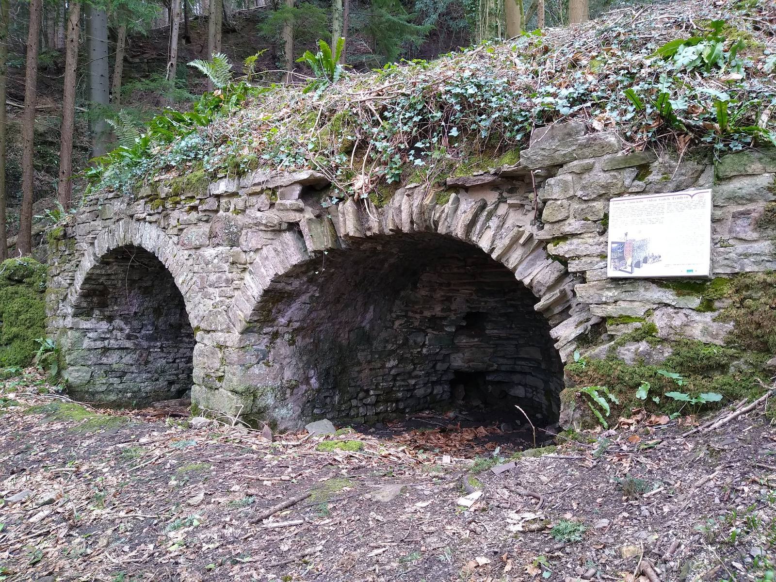 The ruined Tintern limekiln in the Wye valley, Wales, where limestone was burned to quicklime from the 1700s to 1902