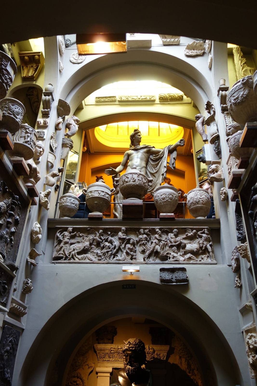 Sir John Soane's Museum, the Dome Area, with the cast of the Apollo Belvedere behind a row of cinerary urns