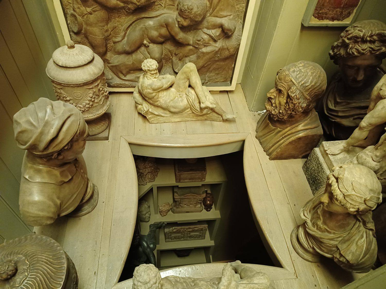 Sir John Soane's Museum, looking down through the Dome Area opening, ringed by busts and an urn