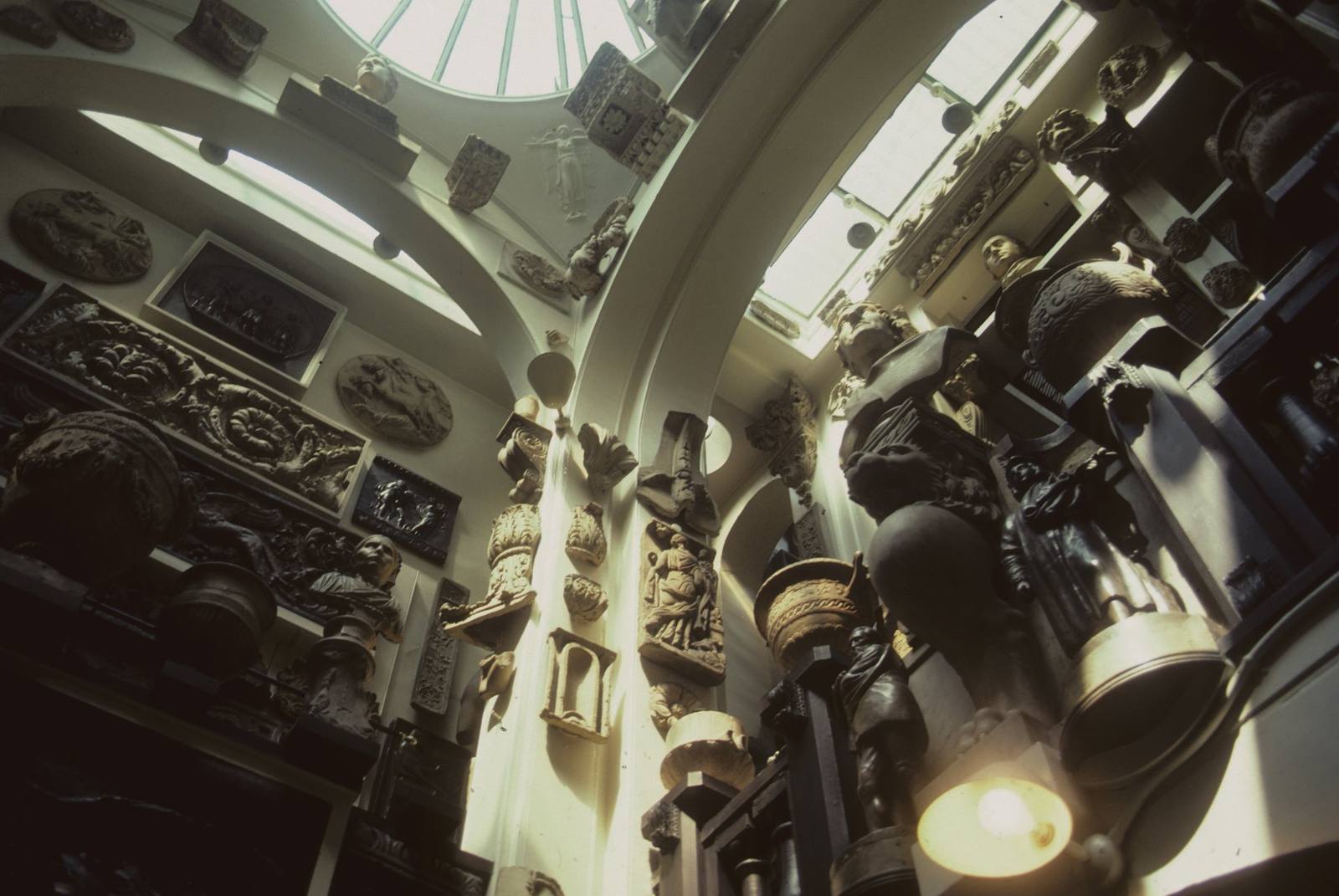 Sir John Soane's Museum, London, the top lit sculpture gallery crowded with casts and fragments
