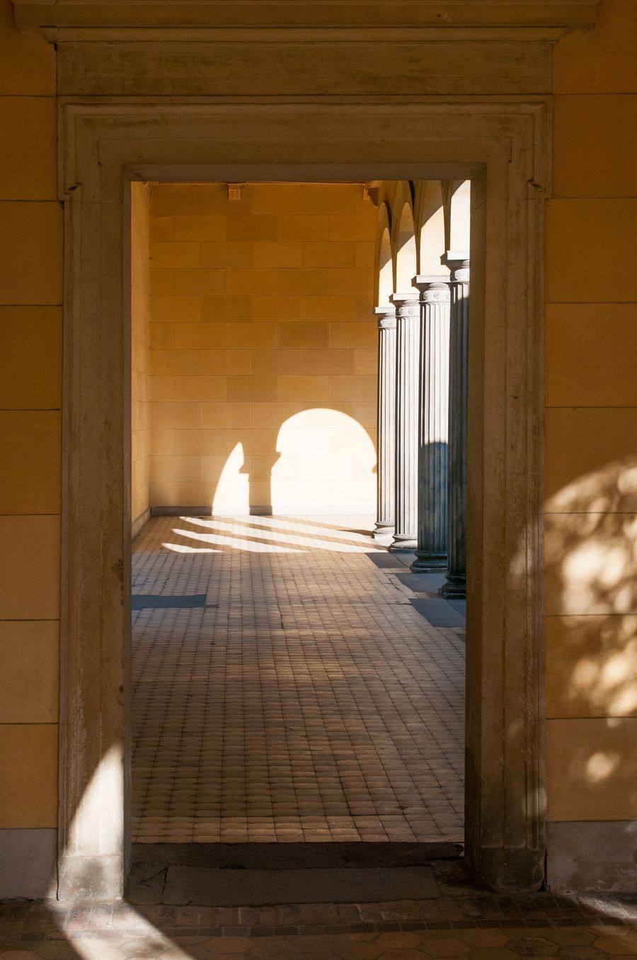 Sunlit colonnade in the gardens of Sanssouci, Potsdam