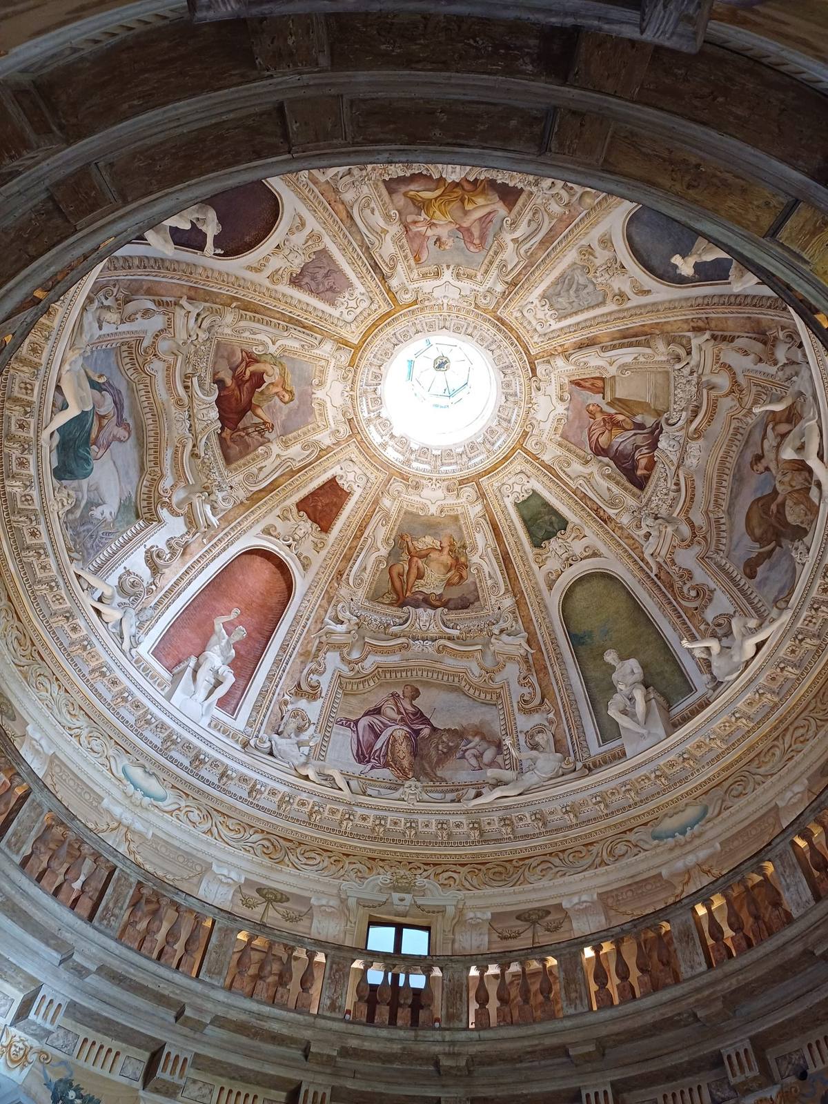 The frescoed dome of Villa Rotonda, Vicenza, seen from the hall below